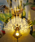 Angel Stake Solar Lights With Crackle Glass Globe Waterproof Warm White LEDs illuminating garden and memorial spaces.