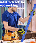 Man inspecting Blue 48 Inch Aluminum T Track Set For Woodworking Six Pack With Predrilled Mounting Holes And Seventy Two Screws Universal Three Quarter Inch Width By Three Eighths Inch Depth Easy Install For Drill Press Tables And Router Tables Ready To Roll in workshop.