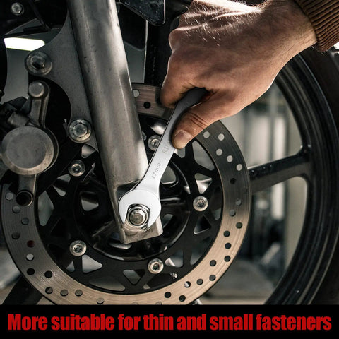 Hand using Super Thin Open End Wrench Set, 16 Piece SAE And Metric Wrenches For Tight Spots on motorcycle wheel, chrome vanadium steel