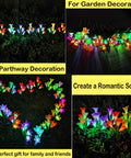 Solar Garden Stake Lights 8 Pack With 32 Lily Flowers Waterproof 7 Color Changing LED Landscape Lights on grass