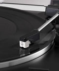 Close-up view of the Audio-Technica At-Lp60X-Bk Fully Automatic Belt Drive Stereo Turntable Black with tonearm on vinyl.