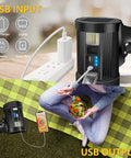 Beast 1 Million Lumens Spotlight With Solar Charging connected to USB, showing input and output functionality, ideal for outdoor use.