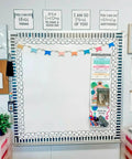 Decorative classroom bulletin board with colorful garland and inspirational quotes