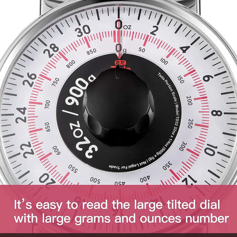 Close-up of 2 Pound Analog Food Scale With 32 Ounces Capacity dial showing grams and ounces measurements.