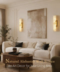 Brushed Brass And Natural Alabaster Wall Sconces Set Of Two Casts A Super Chill Ambient Glow Throughout Your Home Its Smooth Dimmable LED Setup Has Your Bathroom And Bedroom Fully Covered in a modern living room.