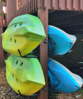 Top Shelf Badass Kayak Wall Mount Rack For Garage Storage securely holds two kayaks with a sturdy steel design.