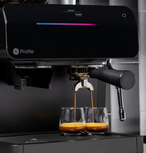 Next Level Semi Automatic Espresso Machine With Built In Grinder Steam Frother Featuring Italian Made 15 Bar Pump For Straight Up Perfect Shots Plus Wifi Connected Custom Brewing In Slick Black brewing espresso into two glasses.