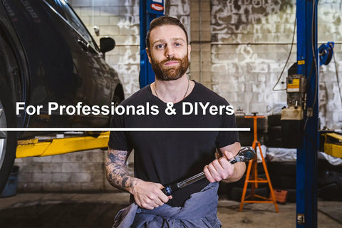 Mechanic holding 3/8 Inch Drive Dual Direction Click Torque Wrench, 10-80 Ft-Lb Range, in a professional garage setting.