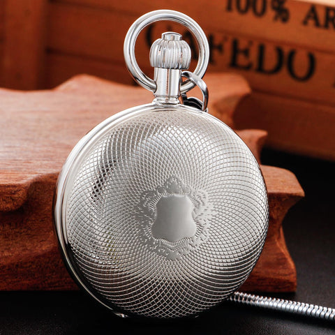 Silver Shield Mechanical Pocket Watch For Men With Double Cover Roman Numeral Dial Chain Included Vintage Dress Timepiece For Everyday Carry Great Gift For Him shown closed with intricate design