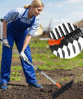 Person using Pro Grade Lawn Dethatcher And Soil Aerator With 57 Inch Handle And 15 Inch Steel Tines for yard work