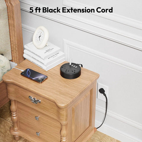 Ultra Flat Plug Power Strip With USB Ports And Wall Mount Space Saver 5ft Extension Cord on wooden nightstand.