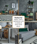 Modern living room with grey furniture, geometric rugs, wooden tables, and plants for tables, chairs, and home decor use.
