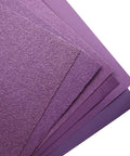 Close-up of purple 9x11 Inch Wet Dry Sandpaper Kit 24 Pcs Alumina Abrasive Grits 60 80 120 150 180 240 320 400 sheets