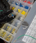 Using 7-Piece Quick Interchangeable Ratchet Crimping Tool Set for Wire Terminals with assorted connectors in a box