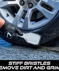 Ergonomic Tire And Wheel Cleaning Brush For Cars, 10.3 Inch Long With Short Stiff Bristles in use on a car tire
