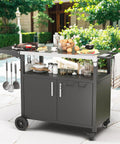 Ultimate Outdoor Grill Cart With Storage And Wheels, Patio Kitchen Island Style BBQ Table With Cabinet in black on patio