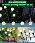 Purple Firefly Solar Lights Outdoor 2 Pack With 16 LEDs waterproof swaying lights with solar panel in rain, garden view