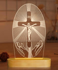 Jesus Cross Night Light USB Powered Cozy Bedside Lamp for Home Decor with Warm Yellow Glow on wooden base in dim room