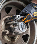 Person using Ten Piece Bolt Biter Set For One Half Inch Drive With Durable Steel Bits Easy Bit Replacement Ideal For Auto Pros And Shop Projects