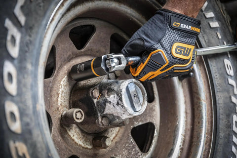 Person using Ten Piece Bolt Biter Set For One Half Inch Drive With Durable Steel Bits Easy Bit Replacement Ideal For Auto Pros And Shop Projects