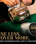 Person using Top Shelf Microcrystalline Wax Polish Kit With Gotto Formula on shiny metal pot with cotton cloth.