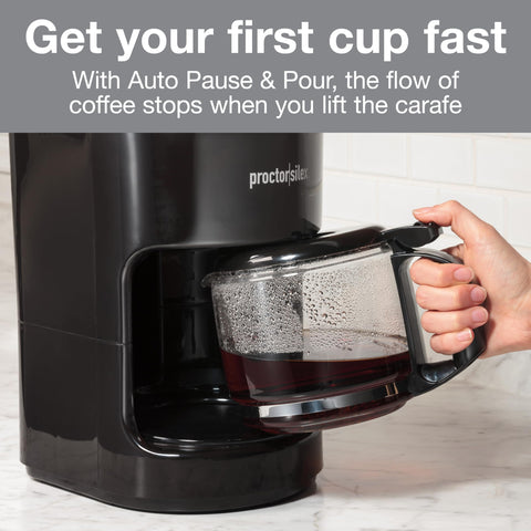 Person holding a borosilicate glass carafe in black 10-Cup Coffee Maker With Auto Pause And Serve, Works With Alexa-Enabled Smart Plugs