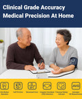 A&D UA-767FAC home blood pressure monitor with wide 22–42 cm upper-arm cuff used by an elderly couple