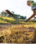 Person using Steel Garden Fork Replacement Head Tines for Soil Turning and Manure Duty in a field