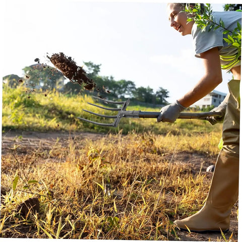 Person using Steel Garden Fork Replacement Head Tines for Soil Turning and Manure Duty in a field