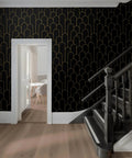 Black And Gold Dope Geometric Peel And Stick Wallpaper For Bedroom Modern Removable Self Adhesive Wall Covering Waterproof Vinyl 17.3 By 118.7 Inches displayed on a wall by a staircase.