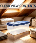 Straight Up Heavy Duty 113 Qt Long Storage Bin With Secure Snap On Lid, Crystal Clear Stackable Plastic Tote For Bulky Blankets And Seasonal Gear in an attic setting.