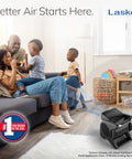 High Velocity Floor Fan 15 Inch Blower With 375 CFM Pivoting Utility Air Mover in living room with family relaxing on sofa