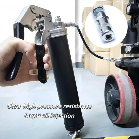 29 Inch Flexible Grease Gun Hose Kit With Spring Shield One Eighth Inch NPT Ends Built Tough High Pressure Extension in use.