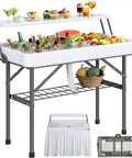 Two Tier Folding Ice Table With Drain And Detachable Skirt, 4 Foot Ice Cooler Table set up with drinks and fruit for events.