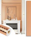 Ridiculously Sleek Rose Gold Metallic Peel And Stick Wall Panels Shimmer Stripe on living room wall with fireplace decor.