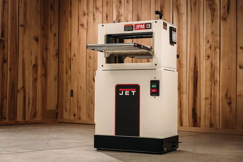 Heavy Duty 13 Inch Planer And Molder Combo For Woodworking Built Like A Tank One Point Five Horsepower Motor in workshop.
