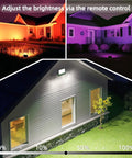 Outdoor 50W RGBW LED Flood Light With Remote Control illuminating houses with adjustable brightness and color modes