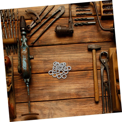 Top Shelf Tapered Lock Washers For M10 Manganese Steel 20 Pack on wooden worktable with tools.