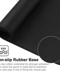 Close-up of Gamer-Grade Extended Mouse Pad With Stitched Edges And Non-Slip Natural Rubber Base, rolled view showing texture.