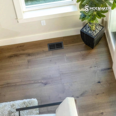 Living room setup with 4x10 Storm Gray Floor Register Vent Cover, Heavy Duty Metal Floor Vent For Home HVAC, installed on wooden floor.