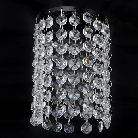 Close-up of crystal drops from Five Light Modern Black Linear Chandelier With Crystal Drops Pendant Lights For Kitchen Island