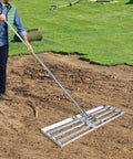 Person using Beefy Heavy Duty Lawn Leveling Rake 30x10 Inch Professional Grade Leveler Tool with Adjustable 78 Inch Handle outdoors