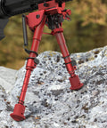 Dope Carbon Fiber Rifle Bipod For Picatinny Rails, Extendable 6 To 9 Inches, on rocky surface with 5-position legs