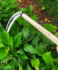 Hand Hoe Sickle Garden Tool For Weeding And Cultivation, Sharp Blade Edge, Durable Japanese Style, 12.99 Inch, Beige handle in use