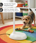 Litespan LED Floor Reading Lamp with white finish base, sturdy design, shown in a colorful room with a playful dog.