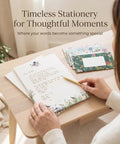 Person writing on a Cute 66-Piece Stationery Kit With Envelopes No-Bleed Lined Paper Floral Designs For Beautiful Handwritten Notes