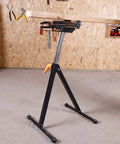Roller Support Stand Twin Pack With 132 Lb Capacity Each, Heavy Duty Steel Roll Stand in workshop, supporting long board