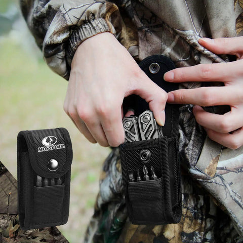 Person using Multitool 21 In 1 Stainless Steel Pocket Knife With Screwdriver Sleeve Self Locking Pliers And Durable Sheath in forest