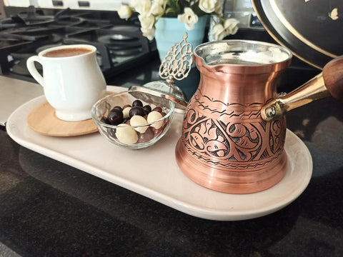 IST Series Thick Solid Copper Engraved Cezve For Stovetop Turkish Greek Arabic Coffee Pot on kitchen counter