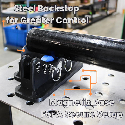 Magnetic Pipe Bevel Roller System For Welding And Fabrication - Steel backstop with magnetic base for secure pipe setup on table.